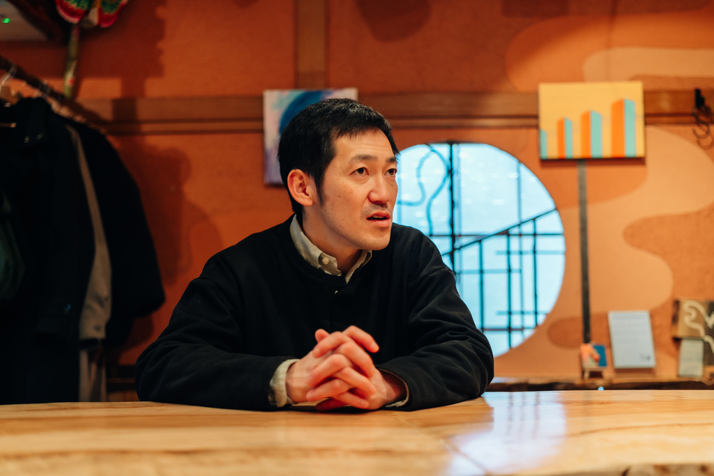 フリーコーヒーに訪れた際のことを話す菊池さん
